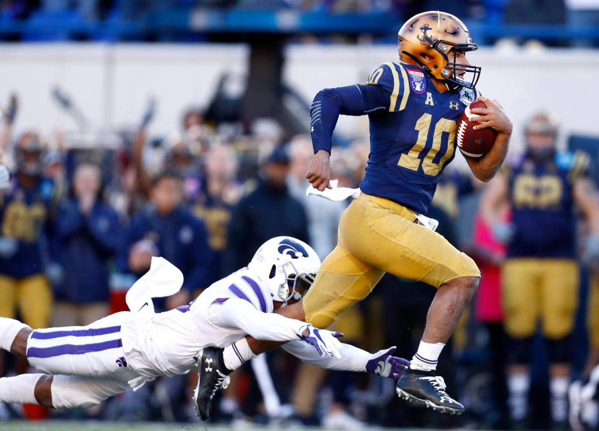 Navy's Malcolm Perry scrambles out of the backfield against Kansas State Joe Rondone, Joe Rondone/The Commercial Appeal, Memphis Commercial Appeal via Imagn Content Services, LLC